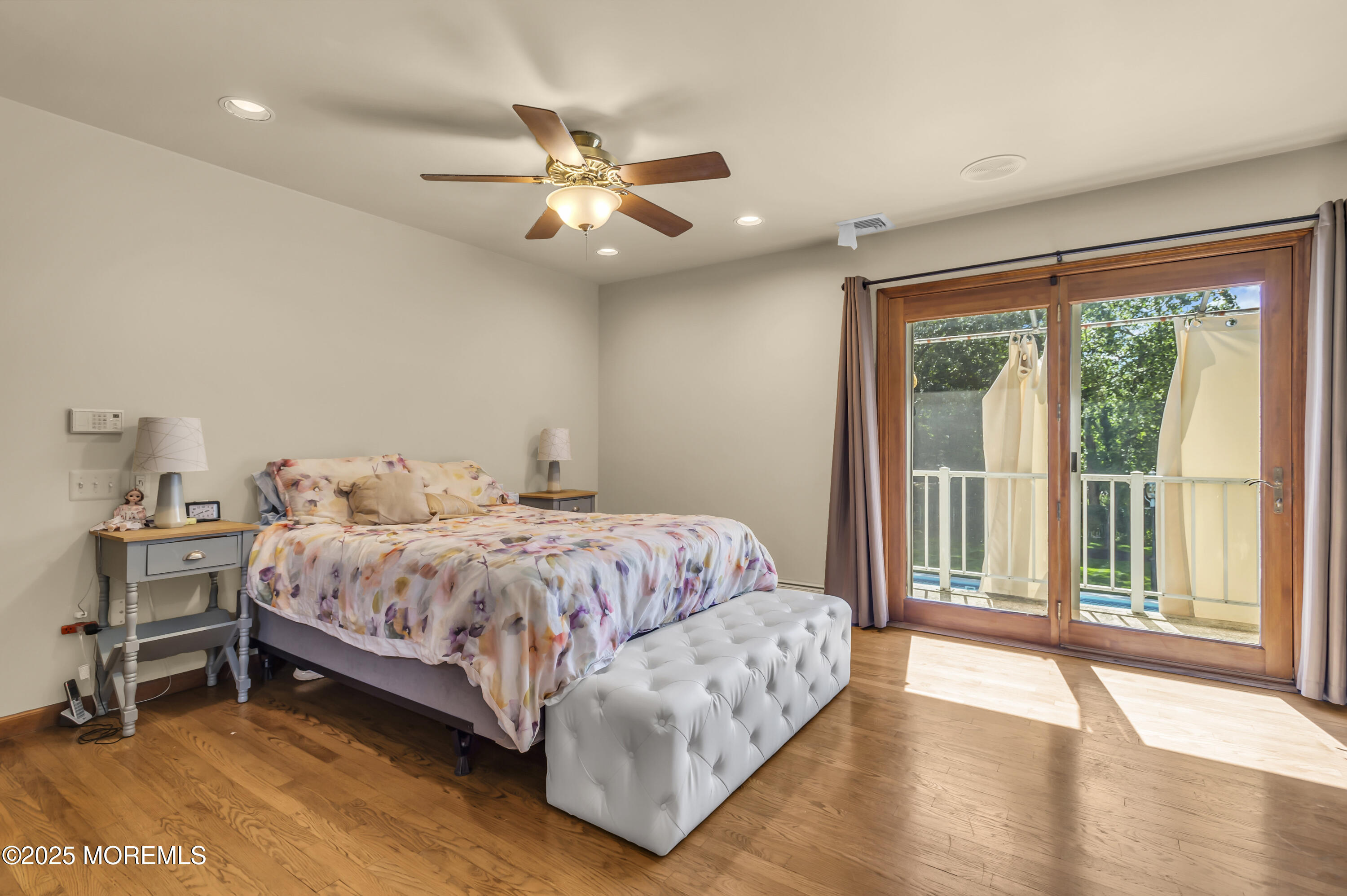 1350 Church Road Toms River, NJ 08755 - Photo 37 of 52 a spacious bedroom with a bed and wooden floor