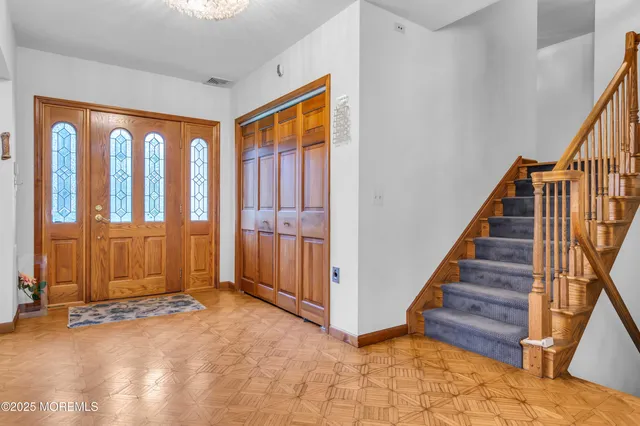 a view of entryway with stairs