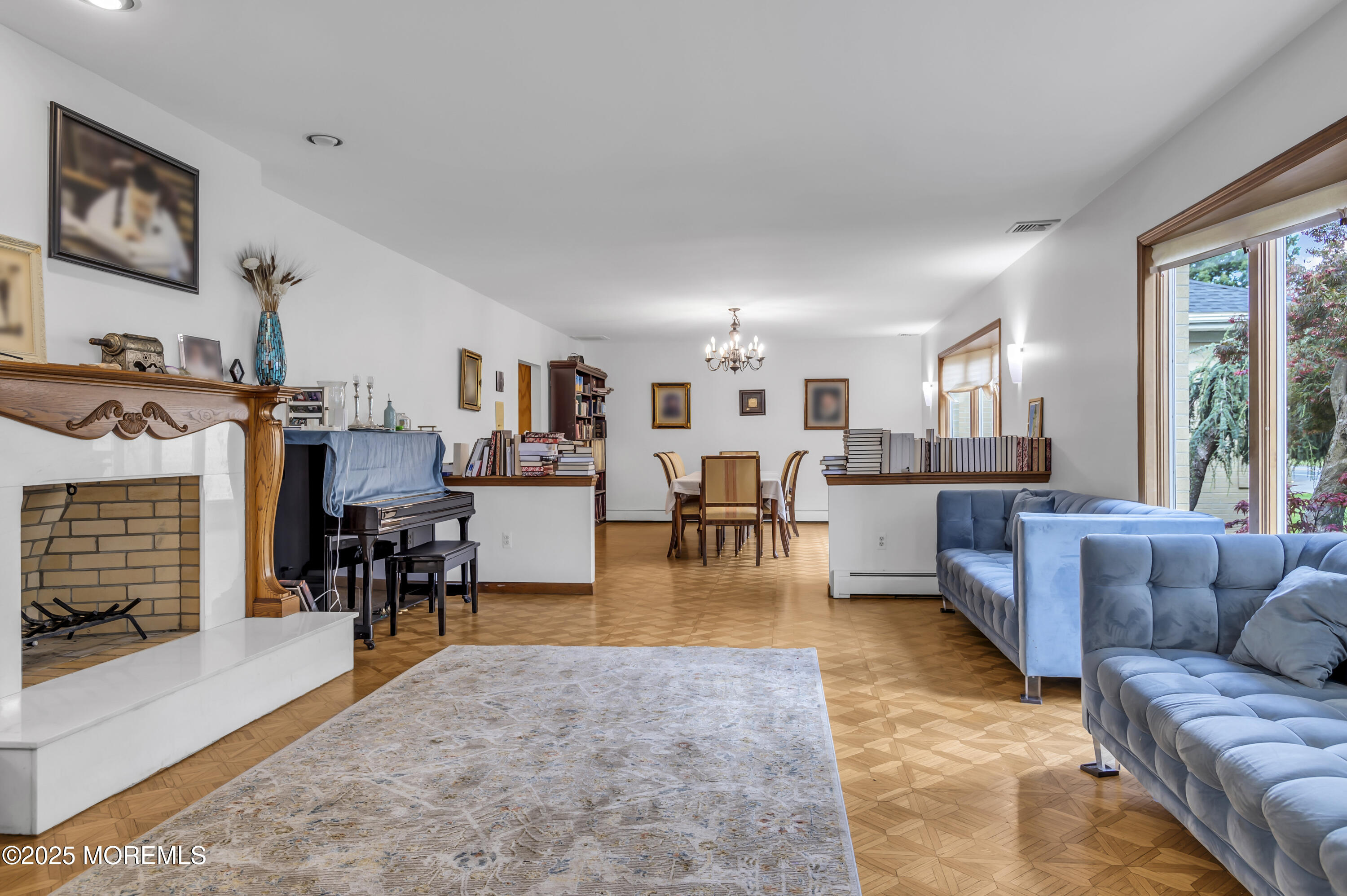 1350 Church Road Toms River, NJ 08755 - Photo 10 of 52 a living room with furniture and a dining table next to a window