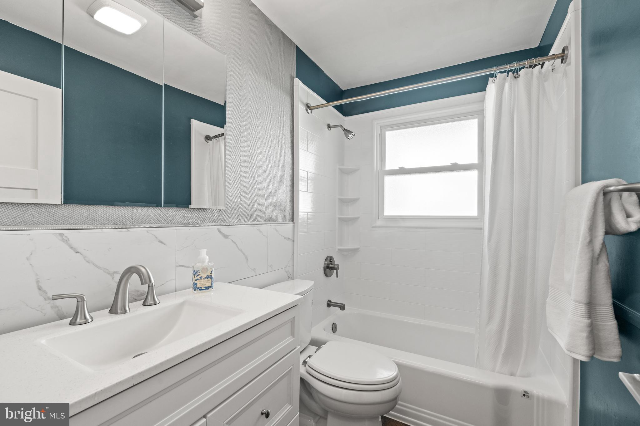 2411 Culpeper Road Alexandria, VA 22308 - Photo 17 of 36 Fully renovated main level Hall Bath (in 2023)