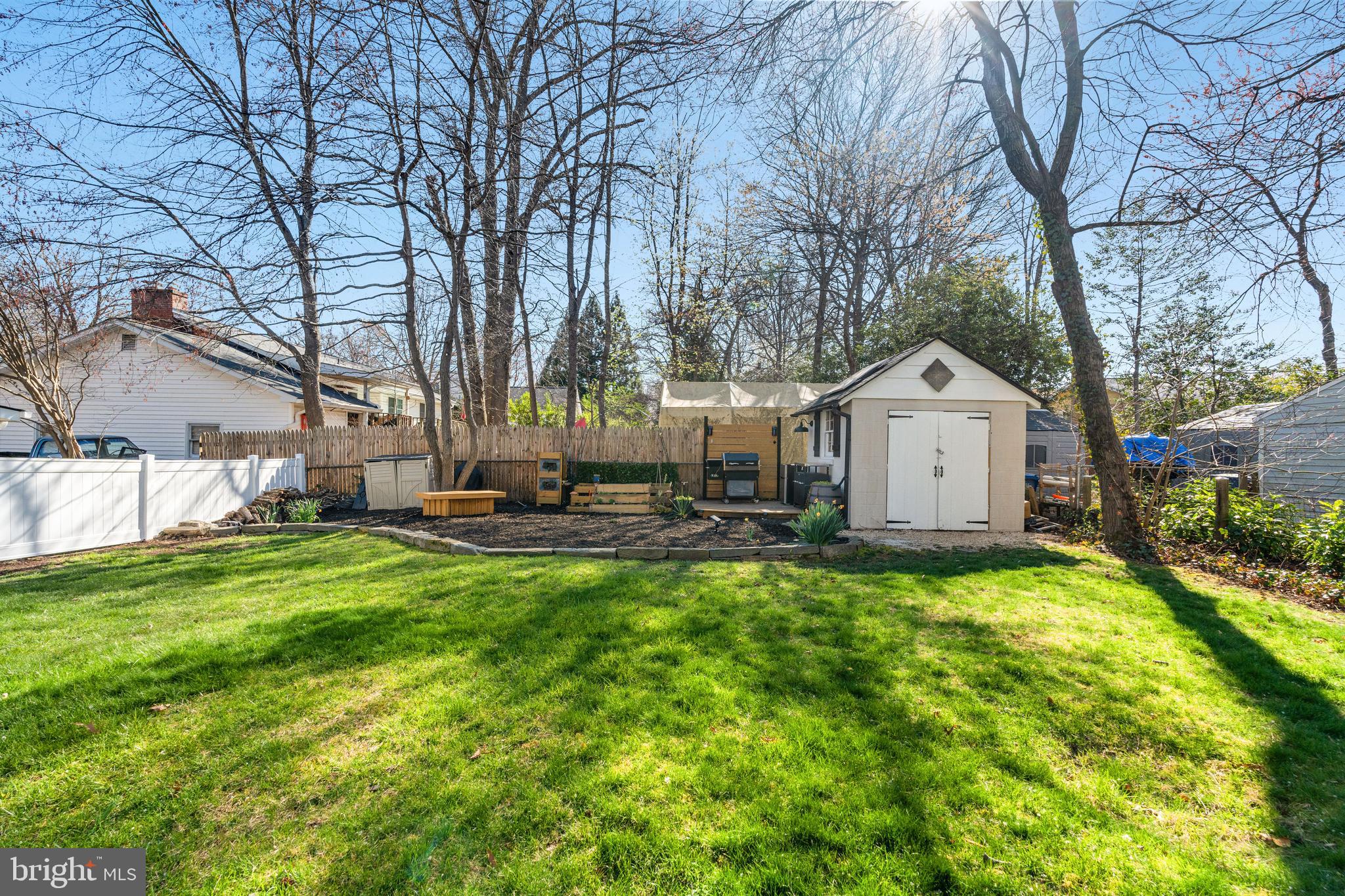 2411 Culpeper Road Alexandria, VA 22308 - Photo 34 of 36 Freshly mulched yard w/ shed, garden, & landscape.