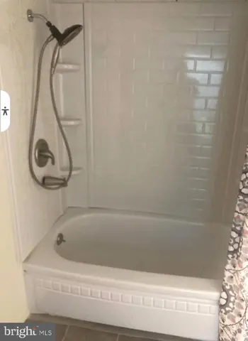 a bathroom with a bathtub