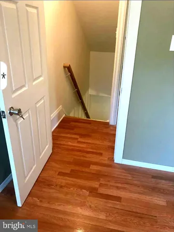 a view of entryway with wooden floor