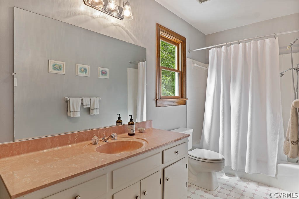 13661 Kingsmill Road Midlothian, VA 23113 - Photo 32 of 50 a bathroom with a granite countertop sink and a mirror