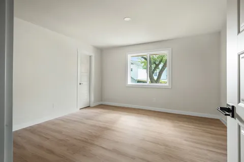 an empty room with windows