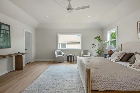 a bed room with a bed and a couch