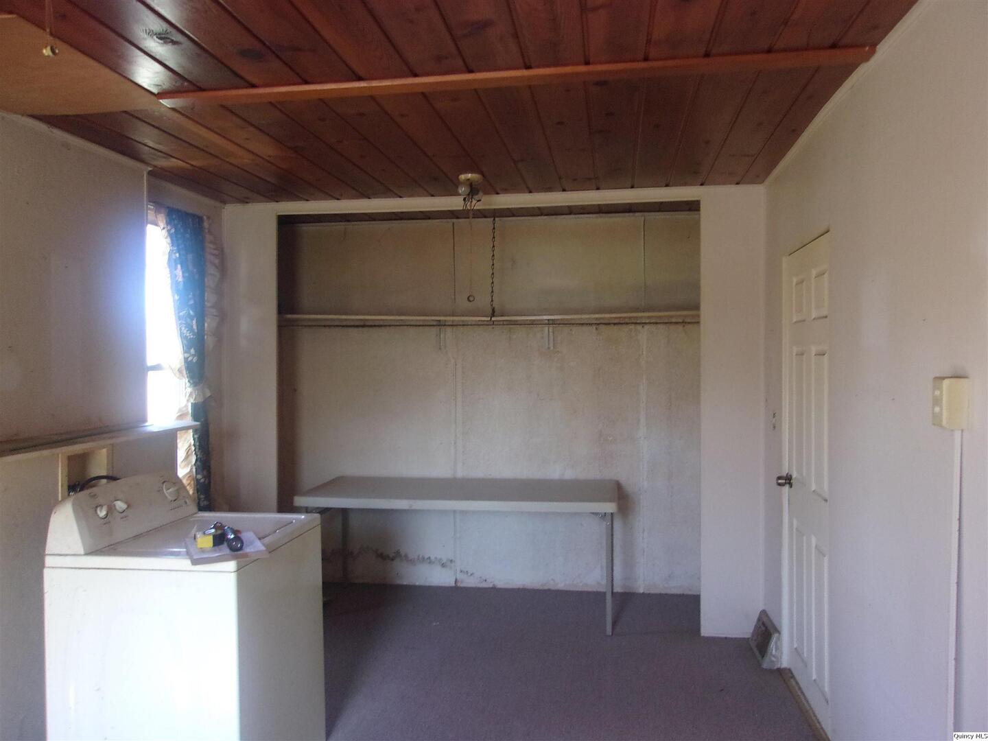 740 South 14th Street Quincy, IL 62301 - Photo 13 of 20 a room with storage and utility