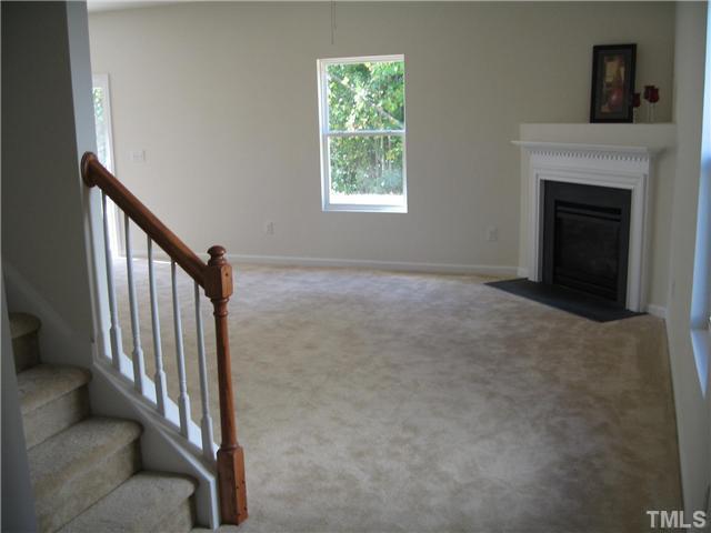 2600 Shepherd Valley Street, Unit LOT74 Raleigh, NC 27610 - Photo 3 of 9 Welcoming family room with gas log fireplace.
