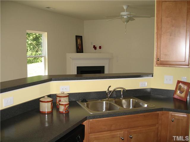 2600 Shepherd Valley Street, Unit LOT74 Raleigh, NC 27610 - Photo 5 of 9 View of the family room from the kitchen.