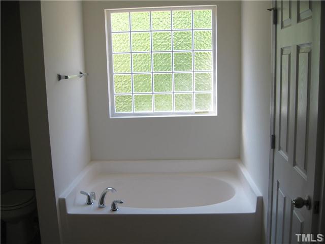 2600 Shepherd Valley Street, Unit LOT74 Raleigh, NC 27610 - Photo 7 of 9 This garden tub and block window are focal points in this beautiful master bath.