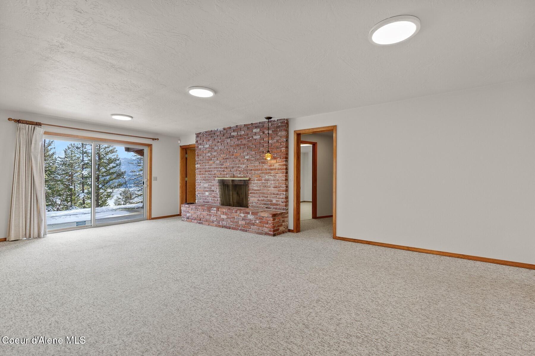 5977 East McMahon Road Hayden, ID 83835 - Photo 18 of 39 Lower Level Living Area