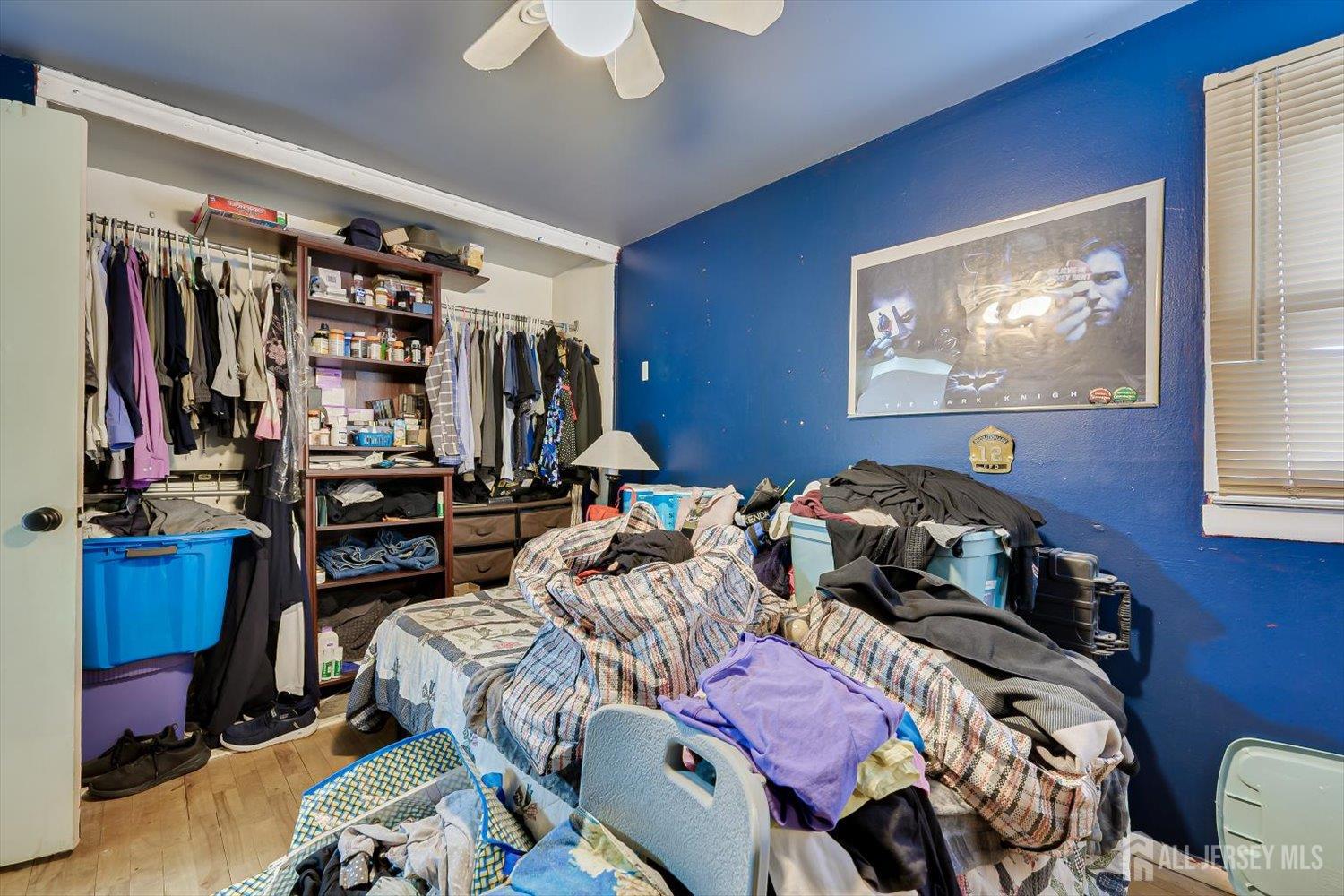 44 McKinley Avenue Colonia, NJ 07067 - Photo 27 of 38 a bedroom with furniture and a flat screen tv