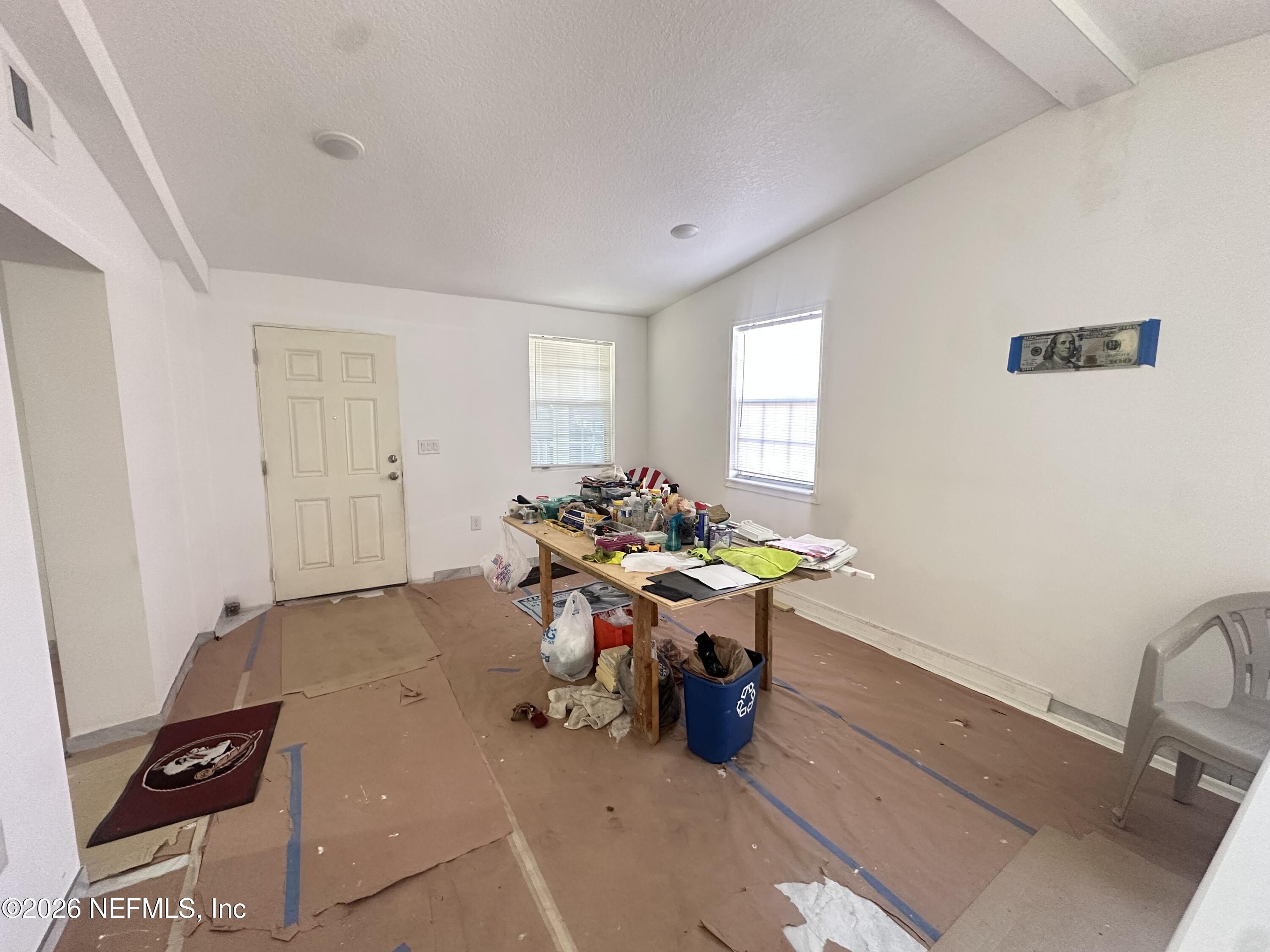11335 Wingate Road North Jacksonville, FL 32218 - Photo 5 of 17 a view of a workspace with a window