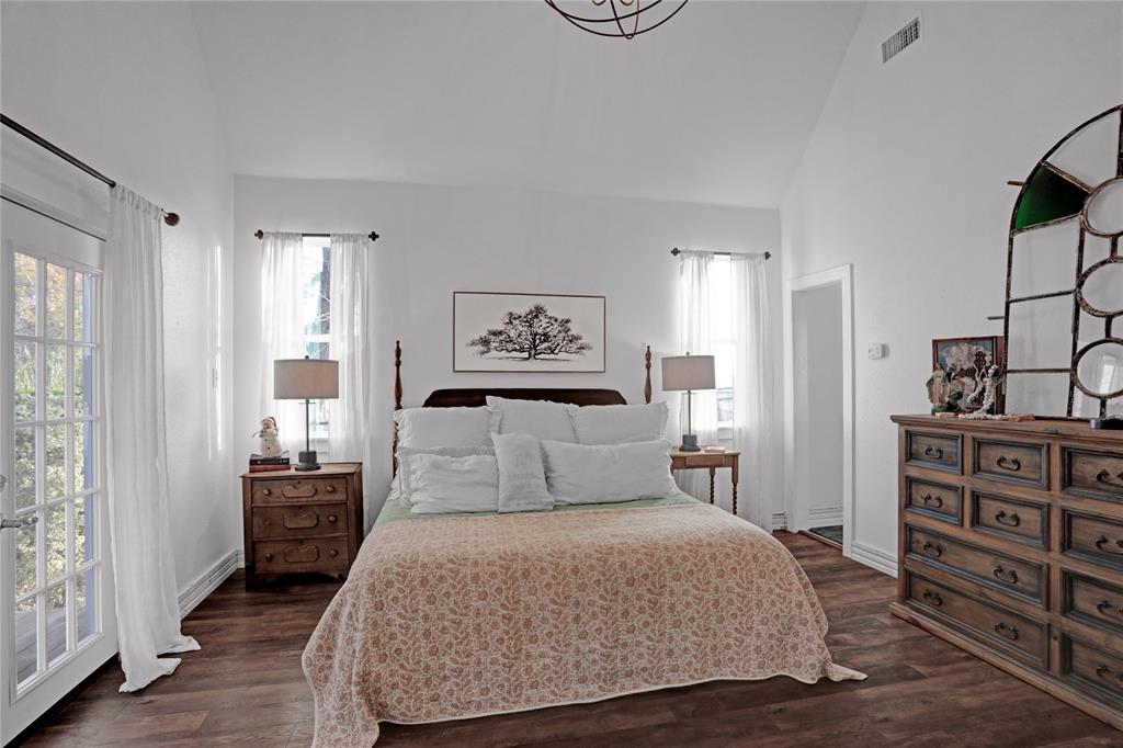 7070 Armadillo Rdg Road McKinney, TX 75071 - Photo 12 of 34 a bedroom with a bed and wooden floor