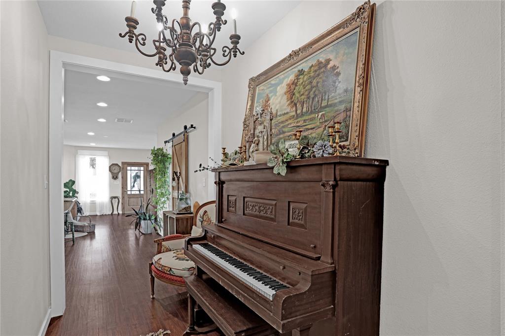 7070 Armadillo Rdg Road McKinney, TX 75071 - Photo 17 of 34 a view of an entryway with wooden floor