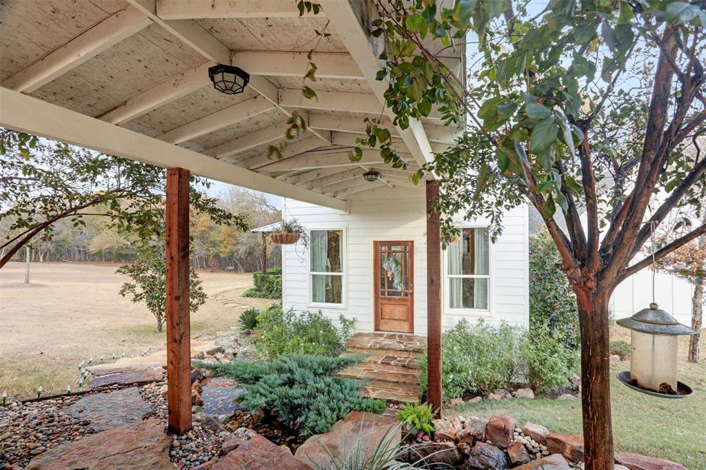 7070 Armadillo Rdg Road McKinney, TX 75071 - Photo 2 of 34 a view of a porch with a tree