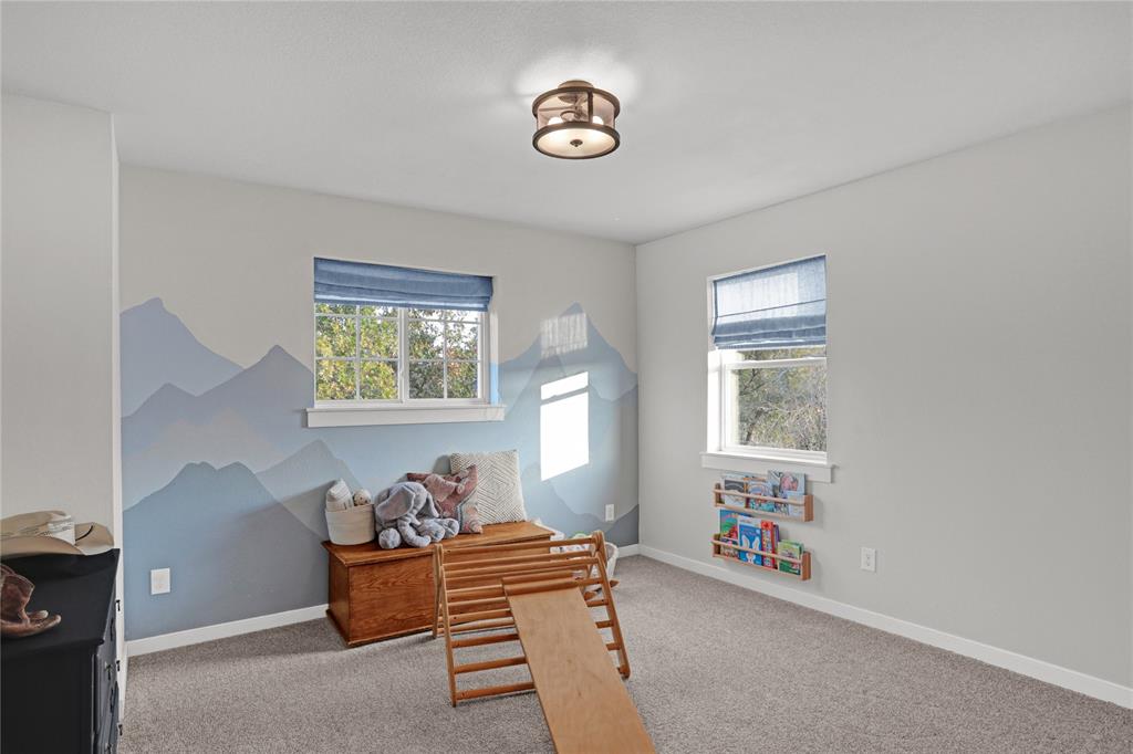 7070 Armadillo Rdg Road McKinney, TX 75071 - Photo 20 of 34 a living room with furniture and a window