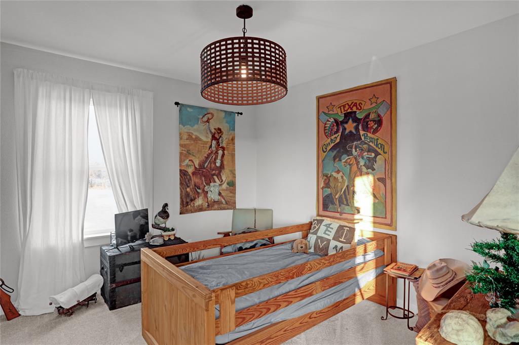 7070 Armadillo Rdg Road McKinney, TX 75071 - Photo 25 of 34 a room with furniture and window