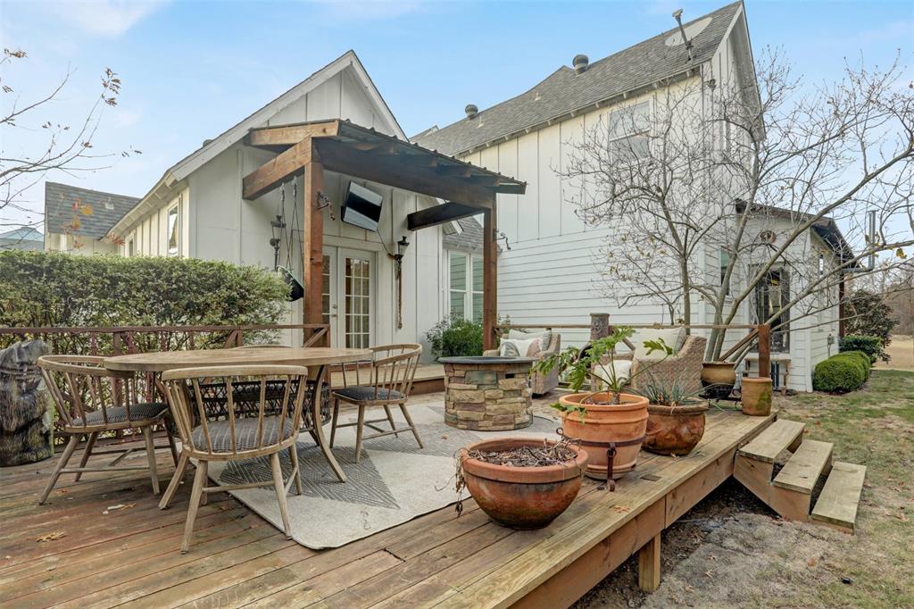7070 Armadillo Rdg Road McKinney, TX 75071 - Photo 32 of 34 a view of a patio with wooden floor