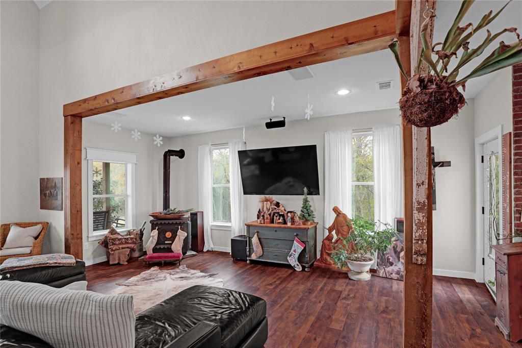 7070 Armadillo Rdg Road McKinney, TX 75071 - Photo 9 of 34 a living room with furniture and a flat screen tv