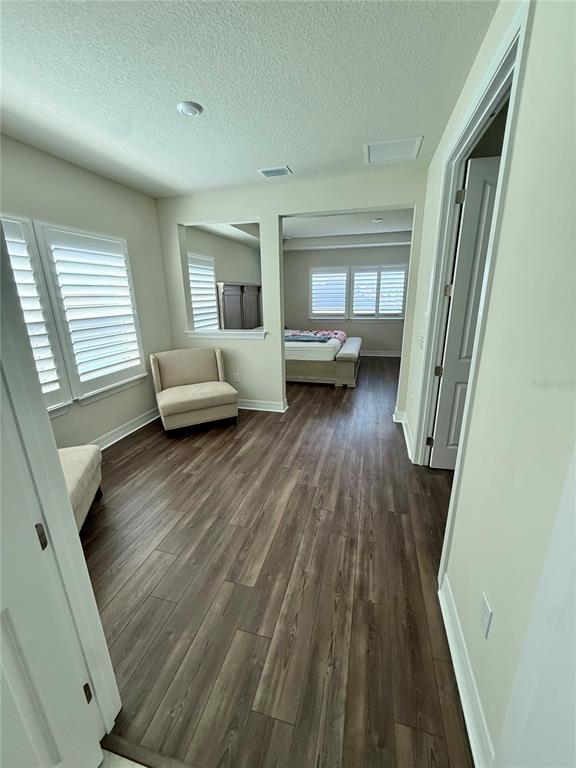 8441 Pk Clf Way Orlando, FL 32836 - Photo 33 of 59 a living room with furniture and a wooden floor