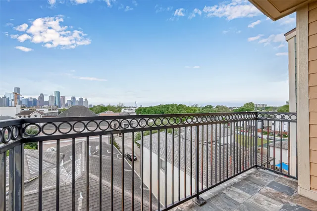 a view of a balcony with an outdoor space
