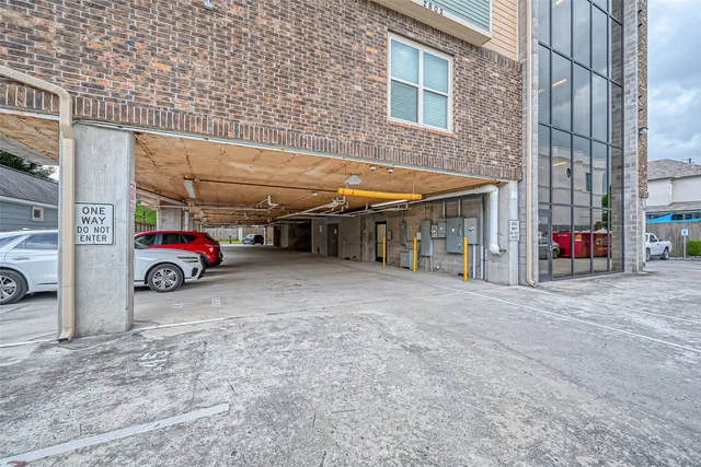 a view of a car park in front of a building