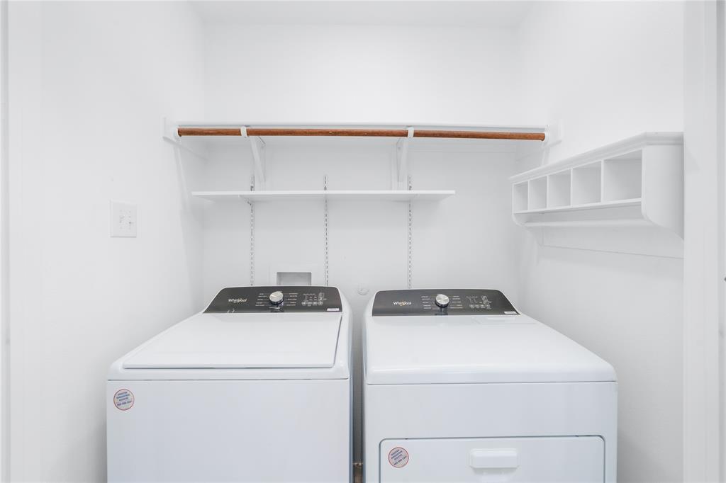 7524 Larson Lane McKinney, TX 75071 - Photo 20 of 24 a utility room with dryer and washer