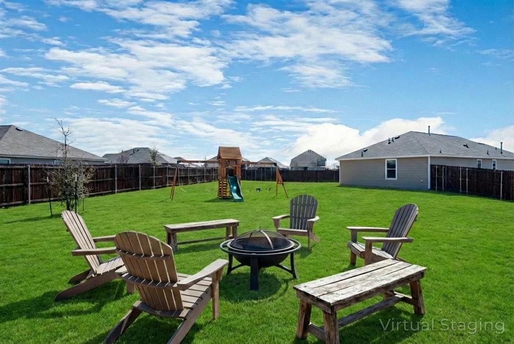 7524 Larson Lane McKinney, TX 75071 - Photo 21 of 24 a view of a table and chairs in the garden