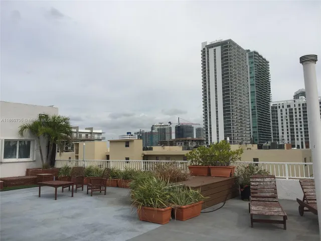 a view of a terrace with chairs