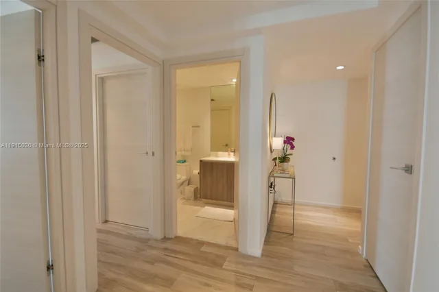 a view of entryway with wooden floor