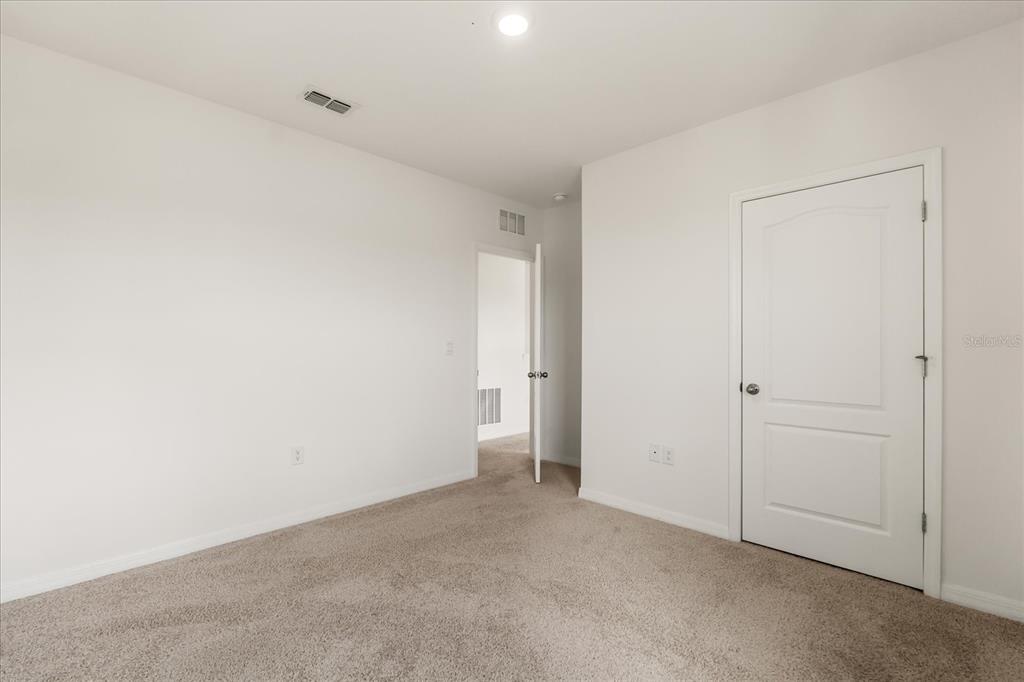 6814 Grace Hammock Road Harmony, FL 34773 - Photo 14 of 41 a view of an empty room