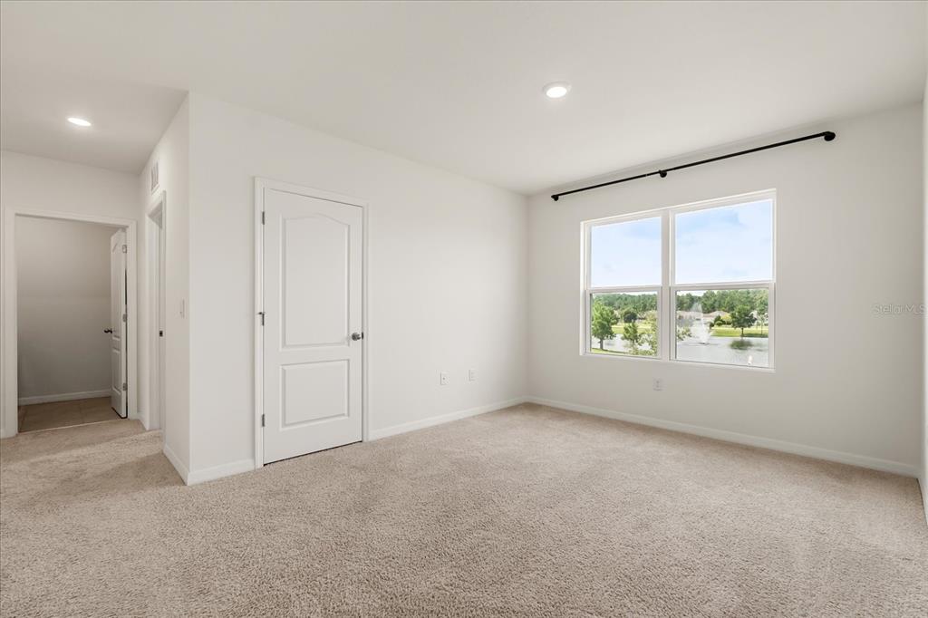 6814 Grace Hammock Road Harmony, FL 34773 - Photo 15 of 41 a view of an empty room with a window