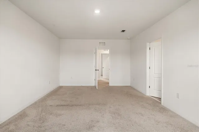 an empty room with an entryway
