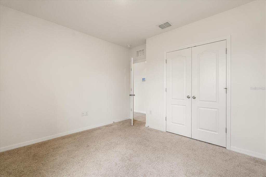 6814 Grace Hammock Road Harmony, FL 34773 - Photo 30 of 41 a view of an empty room