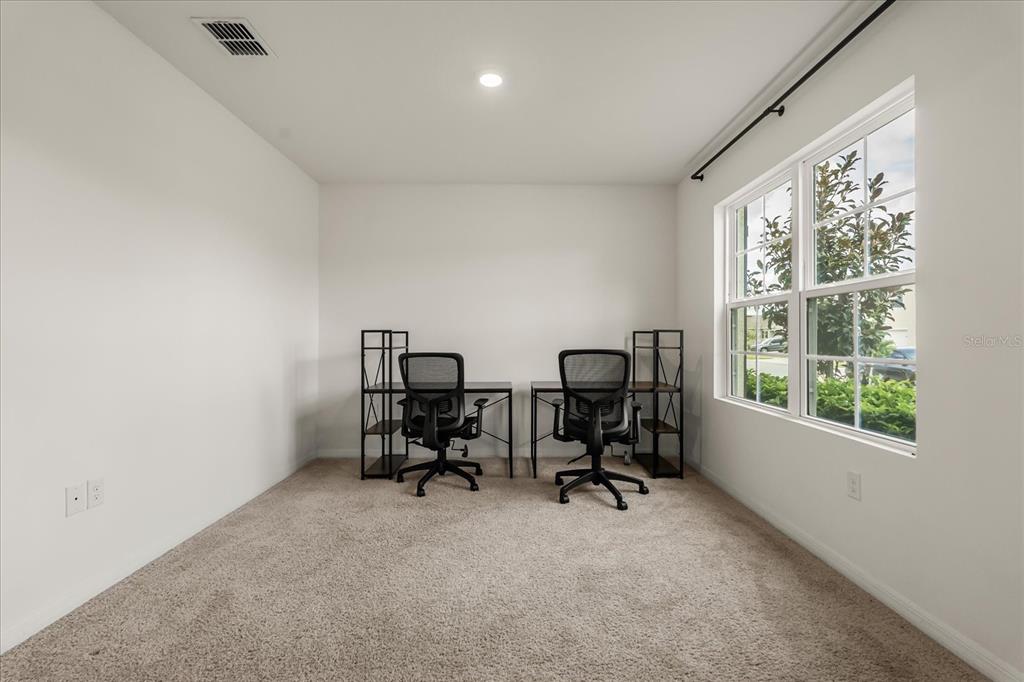 6814 Grace Hammock Road Harmony, FL 34773 - Photo 33 of 41 a view of workspace with windows