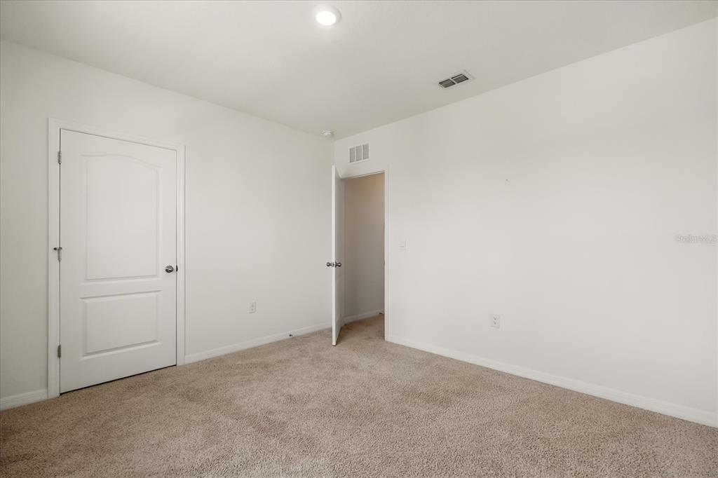 6814 Grace Hammock Road Harmony, FL 34773 - Photo 10 of 41 a view of an empty room