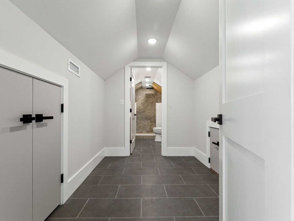 16 High Street, Unit 2 Somerville, MA 02144 - Photo 20 of 34 a view of a hallway