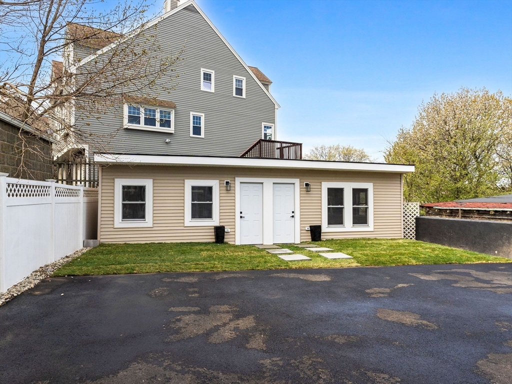 16 High Street, Unit 2 Somerville, MA 02144 - Photo 26 of 34 a view of a house with a patio