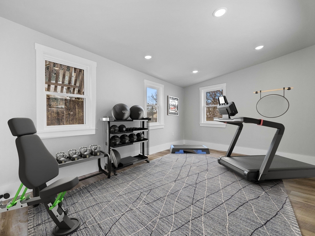 16 High Street, Unit 2 Somerville, MA 02144 - Photo 28 of 34 a living room with furniture and a window