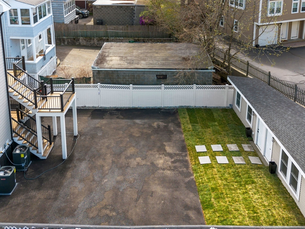 16 High Street, Unit 2 Somerville, MA 02144 - Photo 31 of 34 a view of a backyard with sitting area