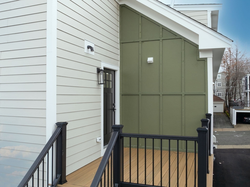 16 High Street, Unit 2 Somerville, MA 02144 - Photo 33 of 34 a view of wooden balcony
