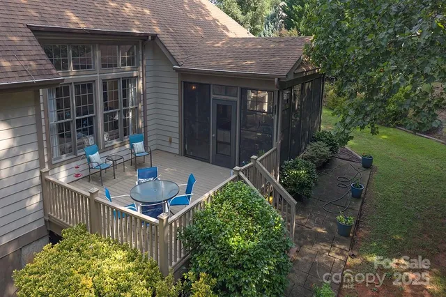 a front view of house with yard and outdoor seating