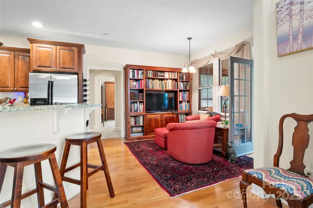 a room with furniture and a book shelf