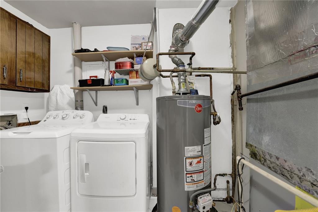 3825 Lavista Road, Unit O1 Tucker, GA 30084 - Photo 19 of 36 a utility room with dryer and washer