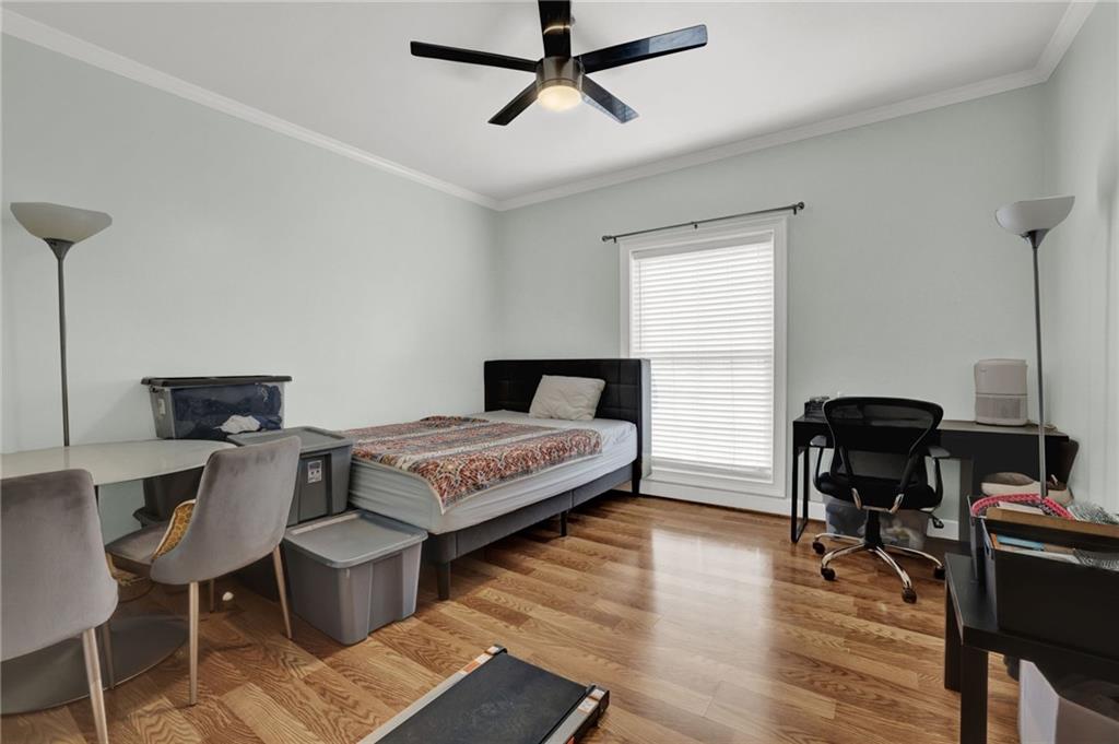 3825 Lavista Road, Unit O1 Tucker, GA 30084 - Photo 20 of 36 a bedroom with a bed and a desk