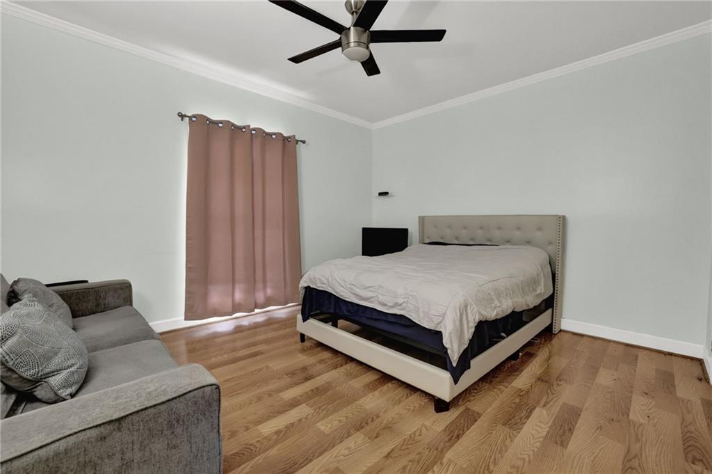 3825 Lavista Road, Unit O1 Tucker, GA 30084 - Photo 21 of 36 a bedroom with a bed and window