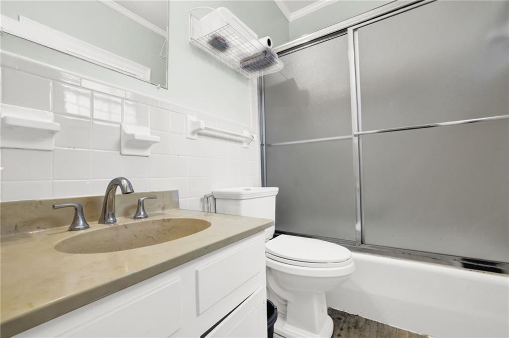 3825 Lavista Road, Unit O1 Tucker, GA 30084 - Photo 26 of 36 a bathroom with a sink toilet and shower