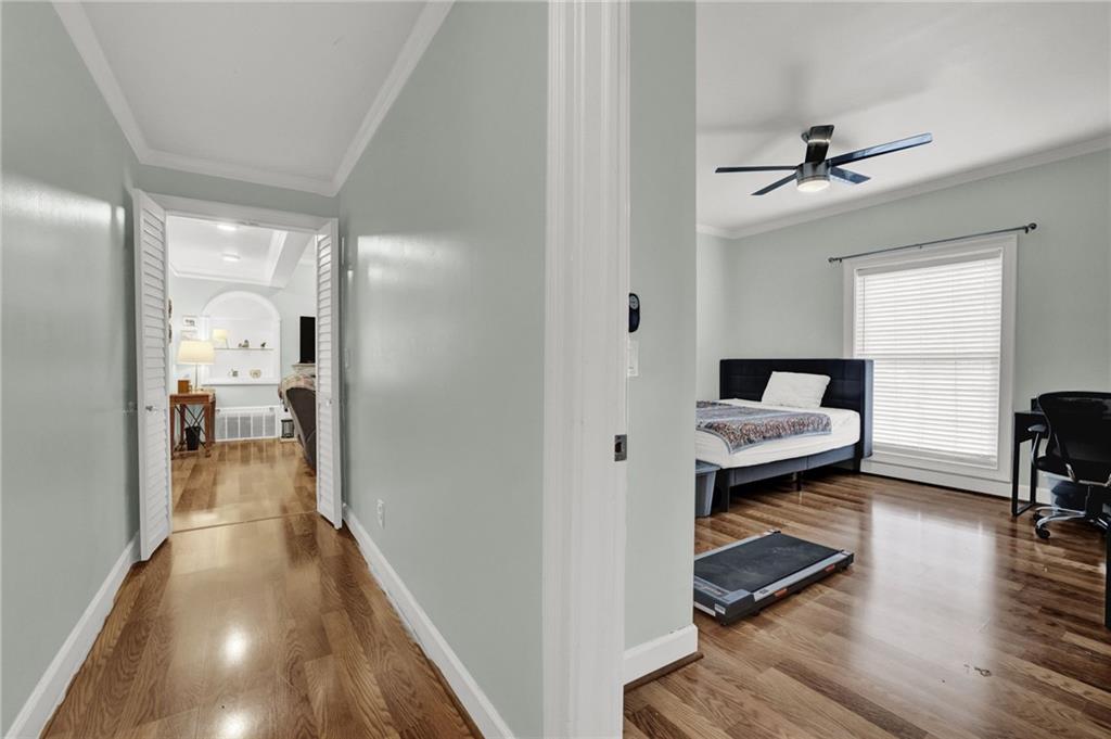 3825 Lavista Road, Unit O1 Tucker, GA 30084 - Photo 27 of 36 a bedroom with a bed and a view of bathroom