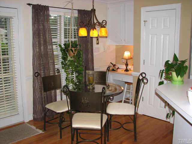2017 Laurel Valley Way Raleigh, NC 27604 - Photo 5 of 10 a view of a dining room with furniture and chandelier